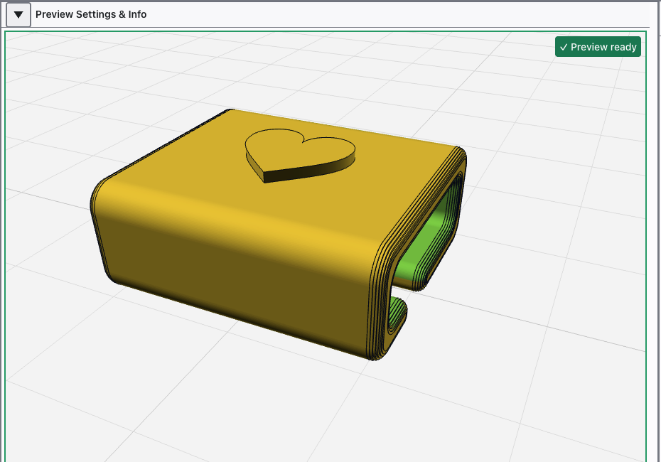 screenshot of a 3D designed charm with a heart icon placed in the center.